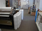 rolls of plans on floor